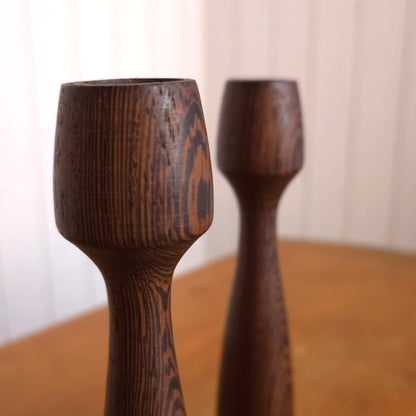 Detail of Danish modern wenge + walnut candle holders